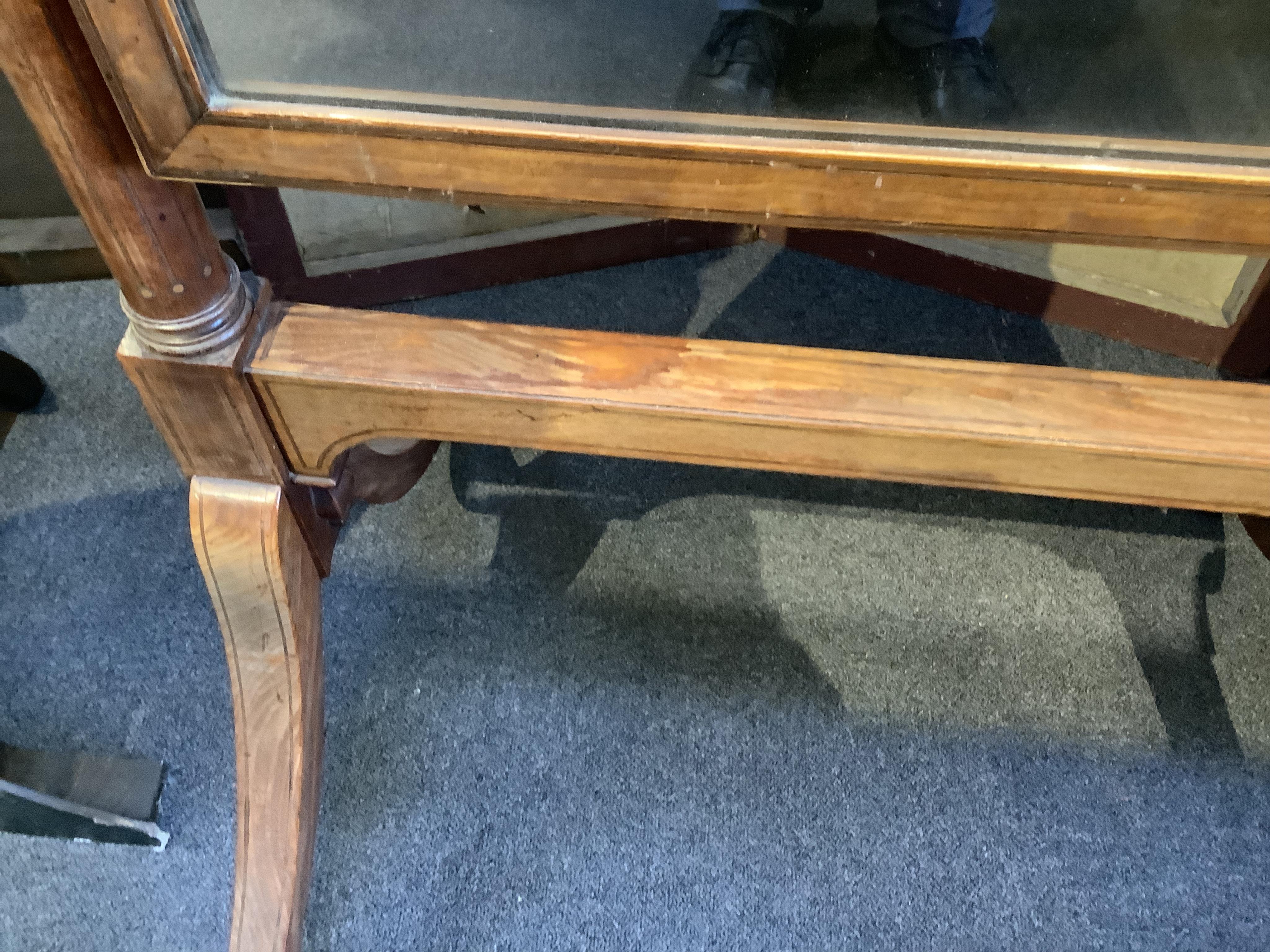 A Regency inlaid mahogany cheval mirror